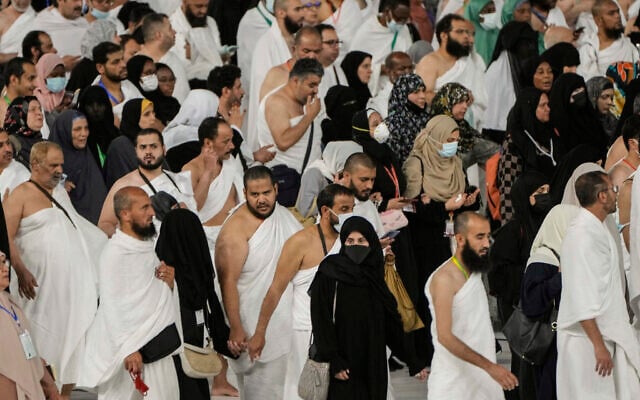 Muslim pilgrims circumambulate around the Kaaba, the cubic building at the Grand Mosque, in Mecca, Saudi Arabia, July 6, 2022. (Amr Nabil/AP) Muslim pilgrims circumambulate around the Kaaba, the cubic building at the Grand Mosque, in Mecca, Saudi Arabia, July 6, 2022. (Amr Nabil/AP)