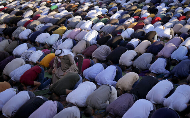 Muslim worshipers offer Eid al-Adha prayers in the West Bank city of Nablus, July 9, 2022 (AP Photo/Majdi Mohammed) Muslim worshipers offer Eid al-Adha prayers in the West Bank city of Nablus, July 9, 2022 (AP Photo/Majdi Mohammed)
