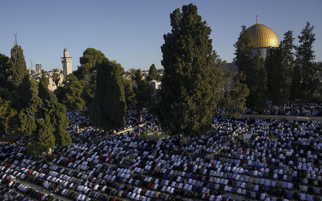 Muslim worshipers offer Eid al-Adha prayers in Jerusalem's Old City, July 9, 2022. (AP Photo/Mahmoud Illean) Muslim worshipers offer Eid al-Adha prayers in Jerusalem's Old City, July 9, 2022. (AP Photo/Mahmoud Illean)