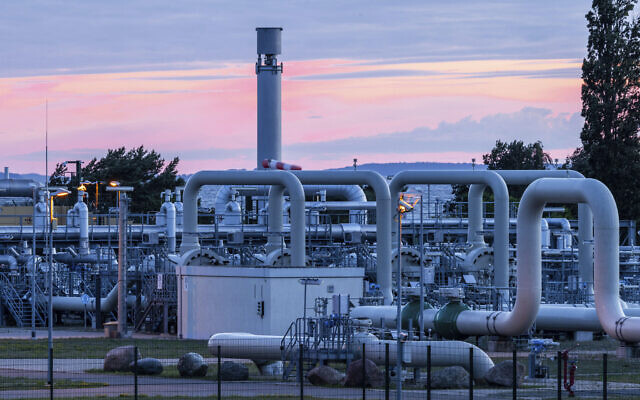 The sun rises behind the pipe systems and shut-off devices at the gas receiving station of the Nord Stream 1 Baltic Sea pipeline and the transfer station of the OPAL gas pipeline, Baltic Sea Pipeline Link, in Lubmin, Germany, July 11, 2022. ( Jens Buettner/dpa via AP) The sun rises behind the pipe systems and shut-off devices at the gas receiving station of the Nord Stream 1 Baltic Sea pipeline and the transfer station of the OPAL gas pipeline, Baltic Sea Pipeline Link, in Lubmin, Germany, July 11, 2022. ( Jens Buettner/dpa via AP)