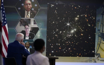 US President Joe Biden listens during a briefing from NASA officials about the first images from the Webb Space Telescope, the highest-resolution images of the infrared universe ever captured, in the South Court Auditorium on the White House complex, July 11, 2022, in Washington. (AP Photo/Evan Vucci) US President Joe Biden listens during a briefing from NASA officials about the first images from the Webb Space Telescope, the highest-resolution images of the infrared universe ever captured, in the South Court Auditorium on the White House complex, July 11, 2022, in Washington. (AP Photo/Evan Vucci)
