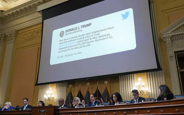 A tweet from former president Donald Trump is shown as the House select committee investigating the Jan. 6 attack on the US Capitol holds a hearing at the Capitol in Washington, July 12, 2022. (AP Photo/J. Scott Applewhite) A tweet from former president Donald Trump is shown as the House select committee investigating the Jan. 6 attack on the US Capitol holds a hearing at the Capitol in Washington, July 12, 2022. (AP Photo/J. Scott Applewhite)