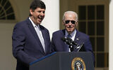 President Joe Biden, right, looks on as his nominee to lead the Bureau of Alcohol, Tobacco, Firearms and Explosives, Steve Dettelbach, speaks during an event in the Rose Garden of the White House in Washington on April 11, 2022. (AP/Carolyn Kaster)