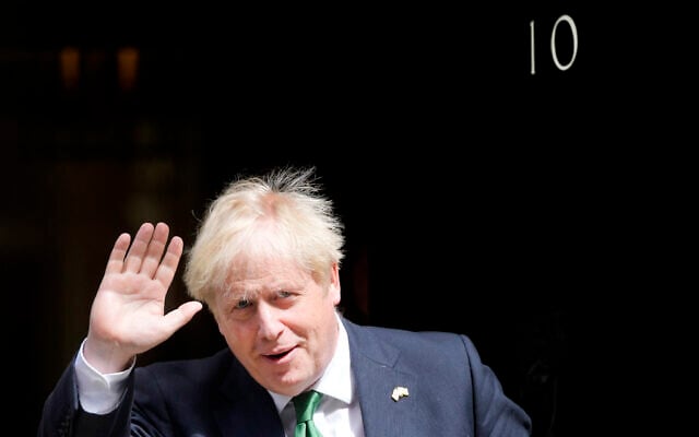 Britain's Prime Minister Boris Johnson leaves 10 Downing Street to attend the weekly Prime Ministers' Questions session in parliament in London, Wednesday, July 13, 2022. (AP/Frank Augstein) Britain's Prime Minister Boris Johnson leaves 10 Downing Street to attend the weekly Prime Ministers' Questions session in parliament in London, Wednesday, July 13, 2022. (AP/Frank Augstein)
