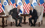 US President Joe Biden, left, and Prime Minister Yair Lapid address the media following their meeting in Jerusalem, July 14, 2022. (AP Photo/Evan Vucci)