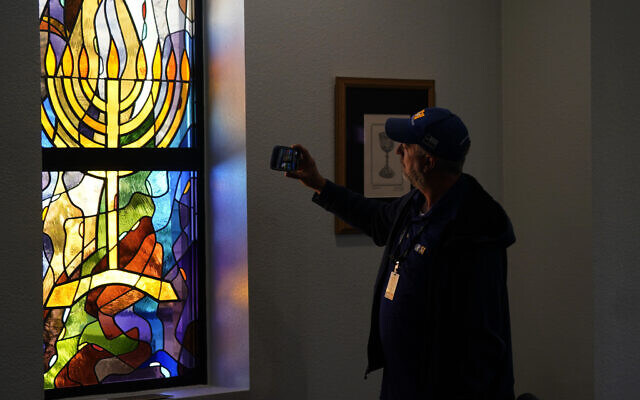 A stained glass window that once had bullet holes is now repaired at Congregation Beth Israel in Colleyville, Texas, April 7, 2022. (AP Photo/LM Otero, File) A stained glass window that once had bullet holes is now repaired at Congregation Beth Israel in Colleyville, Texas, April 7, 2022. (AP Photo/LM Otero, File)