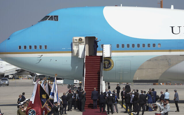 US President Joe Biden waves before his departure to Saudi Arabia from Ben Gurion airport, Israel, Friday, July 15, 2022. (AP Photo/Ariel Schalit, Pool)
