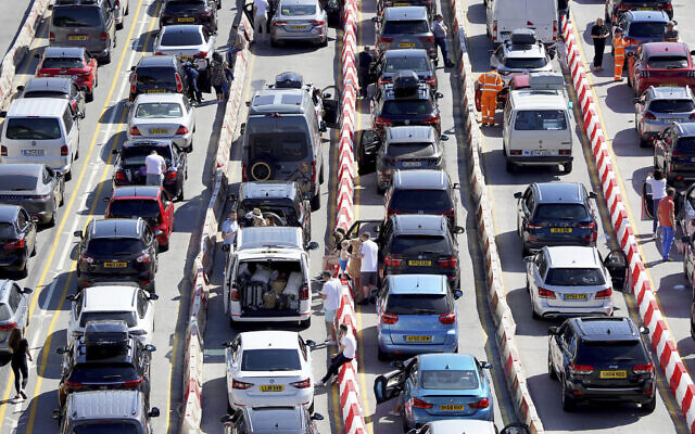 Passengers queue for ferries at the Port of Dover, during the hot weather, in Kent, England, July 16, 2022. (Gareth Fuller/PA via AP) Passengers queue for ferries at the Port of Dover, during the hot weather, in Kent, England, July 16, 2022. (Gareth Fuller/PA via AP)