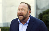 Infowars host and conspiracy theorist Alex Jones speaks outside of the Dirksen building on Capitol Hill in Washington, Sept. 5, 2018. (Jose Luis Magana/AP)