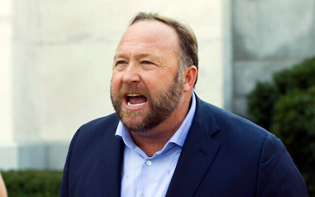 Infowars host and conspiracy theorist Alex Jones speaks outside of the Dirksen building on Capitol Hill in Washington, Sept. 5, 2018. (Jose Luis Magana/AP) Infowars host and conspiracy theorist Alex Jones speaks outside of the Dirksen building on Capitol Hill in Washington, Sept. 5, 2018. (Jose Luis Magana/AP)