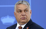 Hungary President Viktor Orban arrives at the NATO Heads of State summit in Madrid, June 30, 2022. Hungary's controversial prime minister is coming to the United States to address a gathering of conservative activists (Bertrand Guay, Pool via AP, File)
