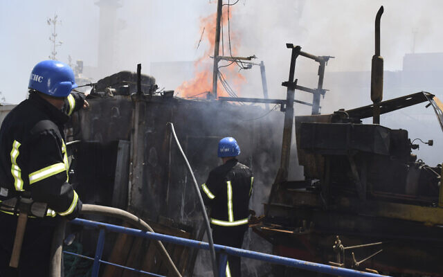 In this photo provided by the Odesa City Hall Press Office, firefighters put out a fire in a port after a Russian missiles attack in Odesa, Ukraine, Saturday, June 5, 2022. (Odesa City Hall Press Office via AP) In this photo provided by the Odesa City Hall Press Office, firefighters put out a fire in a port after a Russian missiles attack in Odesa, Ukraine, Saturday, June 5, 2022. (Odesa City Hall Press Office via AP)