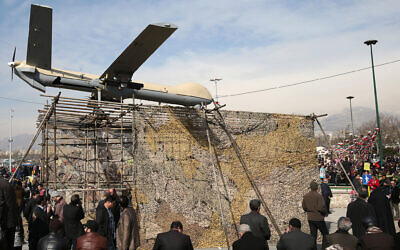 Illustrative: Iranians attend a rally commemorating the 37th anniversary of the Islamic revolution, under a Shahed-129 Iranian drone, displayed by armed forces, in Tehran, Iran, February 11, 2016. (AP Photo/Ebrahim Noroozi)