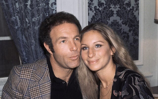 James Caan with Barbra Streisand at a press conference in the Hotel Pierre, New York City, March 11, 1975.(AP Photo/Dave Pickoff)