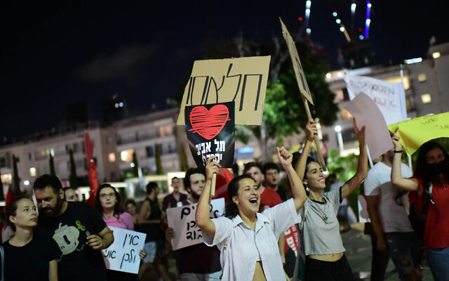 Israelis protest against the soaring housing prices in Tel Aviv and cost of living, on July 2, 2022. (Tomer Neuberg/Flash90) Israelis protest against the soaring housing prices in Tel Aviv and cost of living, on July 2, 2022. (Tomer Neuberg/Flash90)