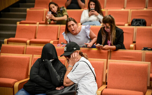 Parents of children abused in a Holon daycare center sit behind the two accused former daycare employees at the District Court in Tel Aviv, July 20, 2022 (Photo by Avshalom Sassoni/Flash90) Parents of children abused in a Holon daycare center sit behind the two accused former daycare employees at the District Court in Tel Aviv, July 20, 2022 (Photo by Avshalom Sassoni/Flash90)