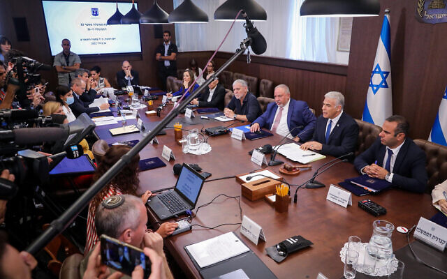 Israeli Prime Minister Yair Lapid holds a cabinet meeting at his office in Jerusalem on July 24, 2022. (Marc Israel Sellem/POOL) Israeli Prime Minister Yair Lapid holds a cabinet meeting at his office in Jerusalem on July 24, 2022. (Marc Israel Sellem/POOL)