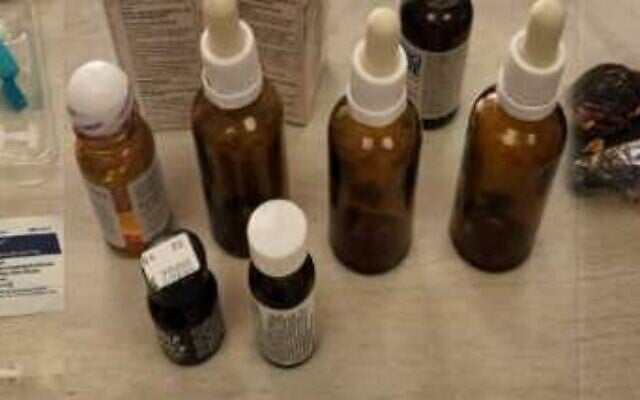 Drug-related items seized at the home of a university professor suspected of dealing drugs to students, July 10, 2022. (Israel Police) Drug-related items seized at the home of a university professor suspected of dealing drugs to students, July 10, 2022. (Israel Police)