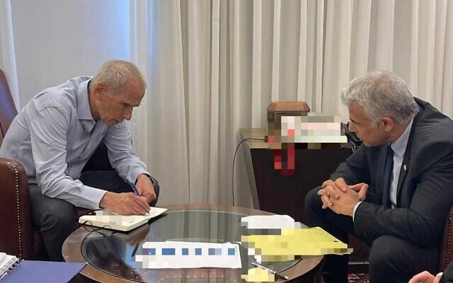 Prime Minister Yair Lapid (right) meets with Public Security Minister Omer Barlev at the Prime Minister's Office in Jerusalem, July 17, 2022. (Courtesy) Prime Minister Yair Lapid (right) meets with Public Security Minister Omer Barlev at the Prime Minister's Office in Jerusalem, July 17, 2022. (Courtesy)