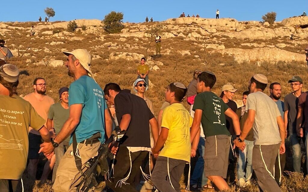 Settler activists at the 'Nofei Yehuda' outpost near Kiryat Arba on July 20, 2022. (Jeremy Sharon) Settler activists at the 'Nofei Yehuda' outpost near Kiryat Arba on July 20, 2022. (Jeremy Sharon)