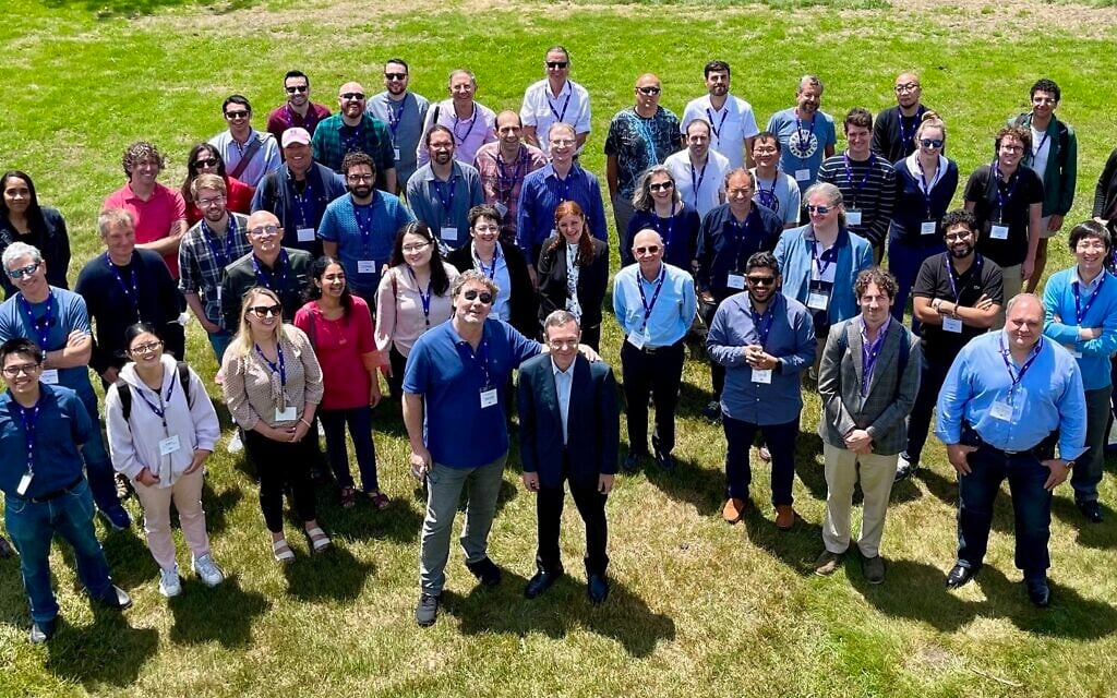 Prof. Avi Loeb, front center, with guests at a conference held in honor of his 60th birthday, Martha's Vineyard, Massachusetts, June 2022. (Courtesy)