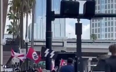 Screen capture from video of nazi demonstrators outside the Turning Point USA Student Action Summit in Tampa, Florida, July 23, 2022. (Twitter)