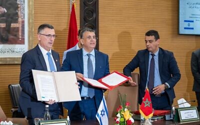 Justice Minister Gideon Sa'ar and his Moroccan counterpart Abdellatif Ouahbi sign a bilateral agreement on legal cooperation in Rabat on July 26, 2022. (Courtesy) Justice Minister Gideon Sa'ar and his Moroccan counterpart Abdellatif Ouahbi sign a bilateral agreement on legal cooperation in Rabat on July 26, 2022. (Courtesy)