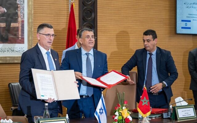 Justice Minister Gideon Sa'ar and his Moroccan counterpart Abdellatif Ouahbi sign a bilateral agreement on legal cooperation in Rabat on July 26, 2022. (Courtesy) Justice Minister Gideon Sa'ar and his Moroccan counterpart Abdellatif Ouahbi sign a bilateral agreement on legal cooperation in Rabat on July 26, 2022. (Courtesy)