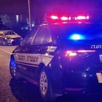 Illustrative: A police car at the scene of a crime. (Israel Police)