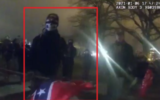 Footage from a police officer's body cam shows David Alan Blair holding a Confederate flag while confronting officers at Capitol Hill, June 6, 2022. (US Department of Justice)