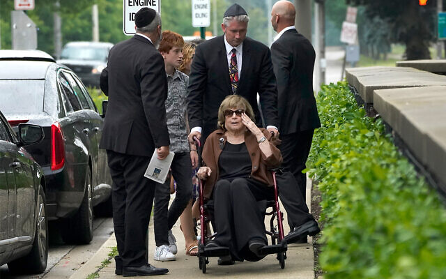 Linda Straus, widow of Stephen Straus, who was killed in a mass shooting at the Fourth of July parade in Highland Park, Ill., arrives for a funeral service with family members at the Jewish Reconstructionist Congregation, July 8, 2022, in Evanston, Ill. Straus was buried earlier in a private family service. (AP Photo/Charles Rex Arbogast) Linda Straus, widow of Stephen Straus, who was killed in a mass shooting at the Fourth of July parade in Highland Park, Ill., arrives for a funeral service with family members at the Jewish Reconstructionist Congregation, July 8, 2022, in Evanston, Ill. Straus was buried earlier in a private family service. (AP Photo/Charles Rex Arbogast)