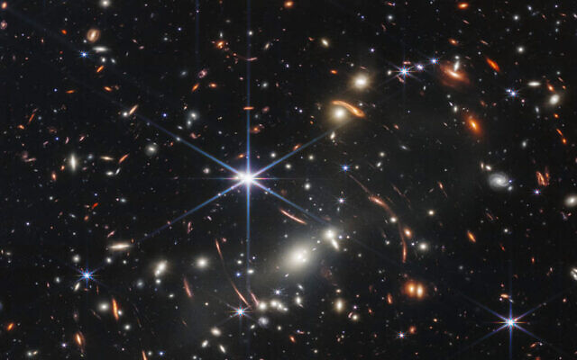 This image provided by NASA on July 11, 2022, shows galaxy cluster SMACS 0723, captured by the James Webb Space Telescope. (NASA/ESA/CSA/STScI via AP)