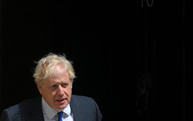 Britain's Prime Minister Boris Johnson walks to a waiting car as he leaves from 10 Downing Street in central London on July 6, 2022. (Daniel Leal/AFP) Britain's Prime Minister Boris Johnson walks to a waiting car as he leaves from 10 Downing Street in central London on July 6, 2022. (Daniel Leal/AFP)