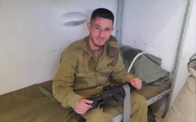 Shehadeh Abu Alqian, 25, who is charged with spying for a Gaza-based terror group, is seen wearing an Israeli military uniform in May 2022. (Courtesy)