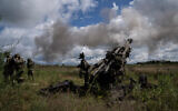 Ukrainian troops fire at Russian positions in Kharkiv region, Ukraine, July 14, 2022. (AP Photo/Evgeniy Maloletka, File)