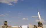 An Iron Dome battery fires an interceptor missile during a trial on the US military’s White Sands test range in New Mexico in an image published on July 18, 2022. (Defense Ministry)