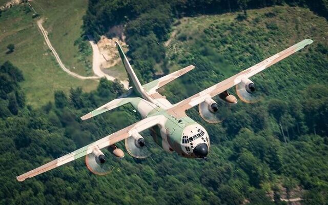 An IAF C-130 transport aircraft is seen flying over Romania, in an image published by the military on July 15, 2022. (Israel Defense Forces)