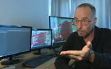 Israeli filmmaker Barak Heymann speaks to Channel 12 news, July 17, 2022. (Screenshot: Channel 12)