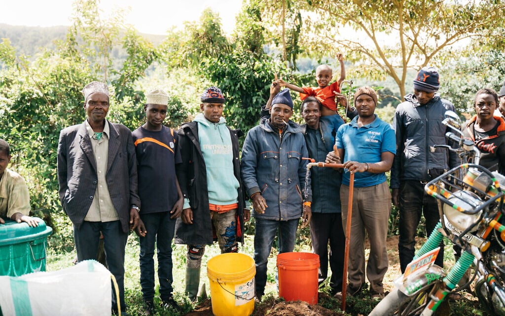 Malindi, Tanzania villagers experience clean running water for first time after Afrikan helps them connect to a clean water source. (Idan Arad/Courtesy of Afrikan)