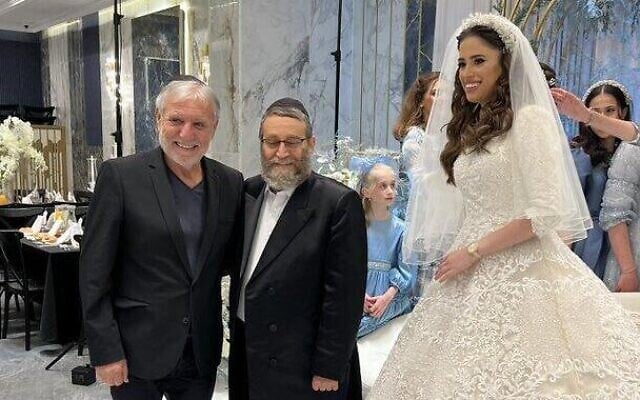 Welfare Minister Meir Cohen (left) with MK Moshe Gafni at the wedding for Gafni's granddaughter Tamar Brecher, July 3, 2022 (screenshot: Twitter, used in accordance with Clause 27a of the copyright law) Welfare Minister Meir Cohen (left) with MK Moshe Gafni at the wedding for Gafni's granddaughter Tamar Brecher, July 3, 2022 (screenshot: Twitter, used in accordance with Clause 27a of the copyright law)