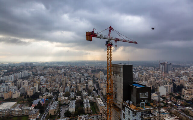 An aerial view of a construction site in Netanya during a cloudy sunrise, March 2019. (edb3_16 via iStock by Getty Images) An aerial view of a construction site in Netanya during a cloudy sunrise, March 2019. (edb3_16 via iStock by Getty Images)