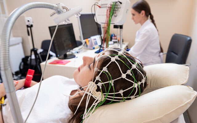 Illustrative image: A patient having their brain activity using an encephalography, which Israeli scientists say could be used to assess whether people in comas are processing sounds around them (romaset vis iStock by Getty Images)