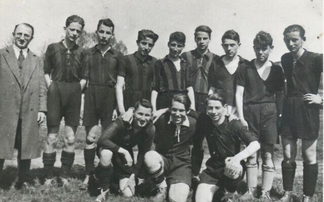 An undated photograph of Rolf Friedland, later Ralph Freeman (top row, third from left), with his football team in Berlin. (Courtesy) An undated photograph of Rolf Friedland, later Ralph Freeman (top row, third from left), with his football team in Berlin. (Courtesy)