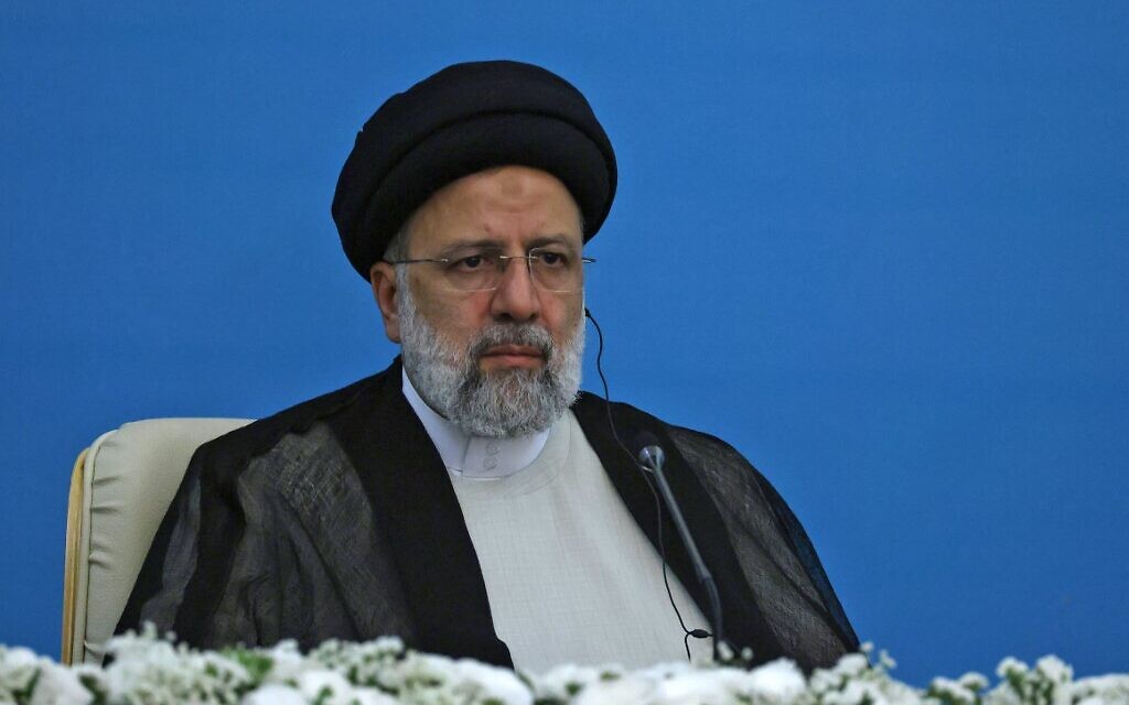 Iran's President Ebrahim Raisi looks on during a joint press conference with his Russian and Turkish counterparts following their summit in Tehran, July 19, 2022. (ATTA KENARE / AFP) Iran's President Ebrahim Raisi looks on during a joint press conference with his Russian and Turkish counterparts following their summit in Tehran, July 19, 2022. (ATTA KENARE / AFP)