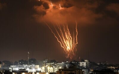 Palestinians in Gaza fire rockets at Israel on August 5, 2022. (MAHMUD HAMS / AFP)
