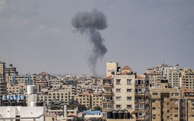 Smoke rises after an Israeli air strike in Gaza City on August 6, 2022. Israel has been carrying out strikes on terror targets in the enclave as rockets are fired toward Israeli communities (MAHMUD HAMS / AFP)