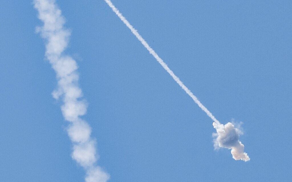 Missiles from Israel's Iron Dome air defense system, intercept and destroy rockets fired from the Gaza Strip, on the outskirts of the southern city of Ashkelon, on August 7, 2022. (Jack Guez/AFP)