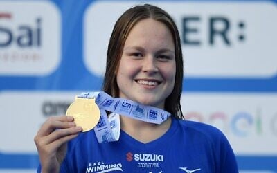 Israeli gold medalist Anastasya Gorbenko poses on the podium after winning the Women's 200-meter individual medley final event on August 16, 2022 during the LEN European Aquatics Championships in Rome. (Filippo Monteforte/AFP) Israeli gold medalist Anastasya Gorbenko poses on the podium after winning the Women's 200-meter individual medley final event on August 16, 2022 during the LEN European Aquatics Championships in Rome. (Filippo Monteforte/AFP)