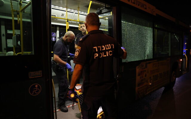 Police inspect the scene of a terror shooting outside Jerusalem's Old City, August 14, 2022. (Yonatan Sindel/Flash90)