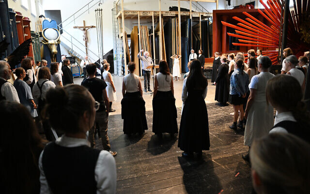 Members of the Oberammergau Passion Play, which has been telling the New Testament story of Jesus’ death and resurrection since 1634, sing backstage in Oberammergau, Germany, July 12, 2022. (Angelika Warmuth/picture alliance via Getty Images/ via JTA)